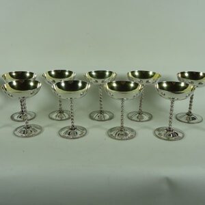 Twelve champagne glasses